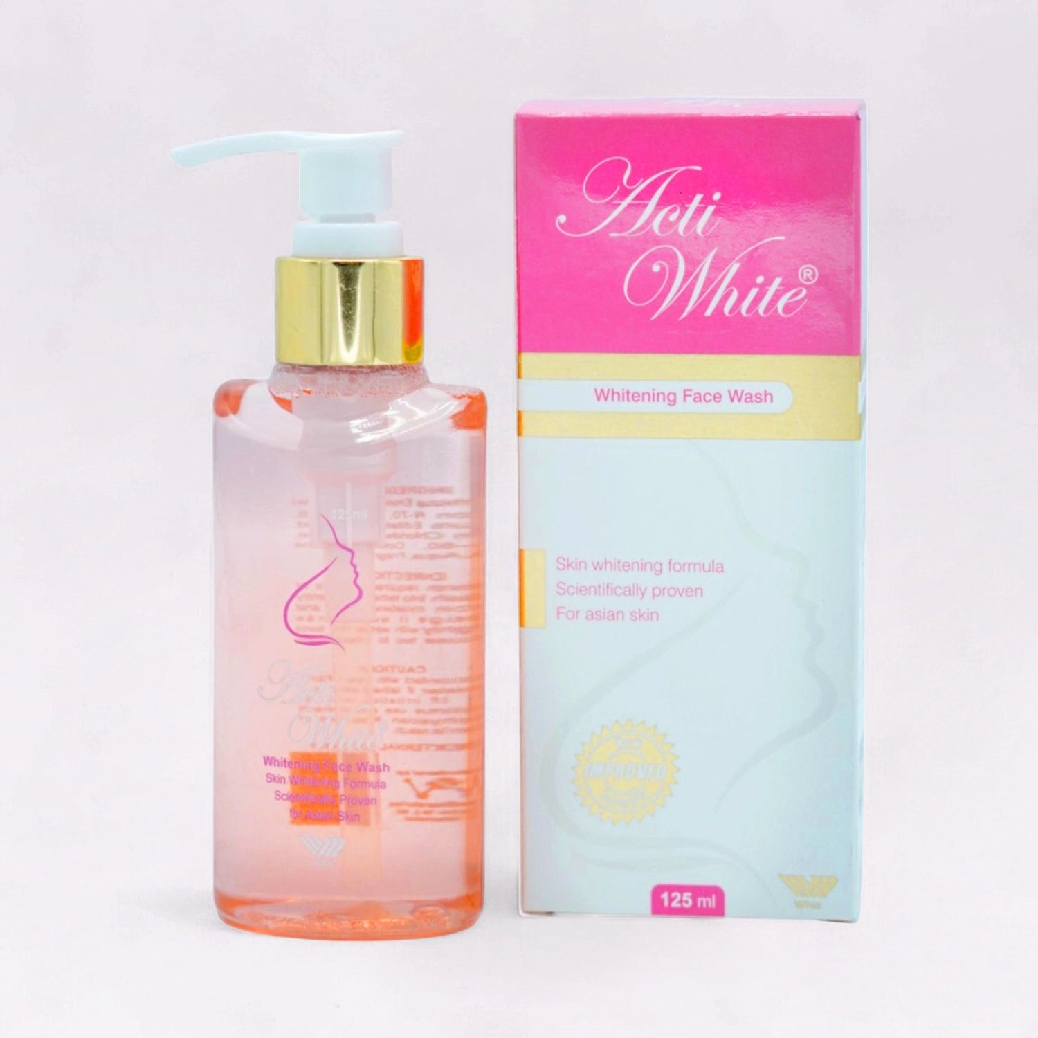 ACTIWHITE FACEWASH, 125ml pump bottle with a pink liquid and a gold pump, alongside its pink and white box.