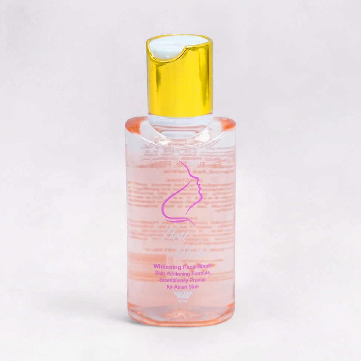 Acti White Whitening Face Wash, 60ml clear bottle with a pink liquid and a gold cap.