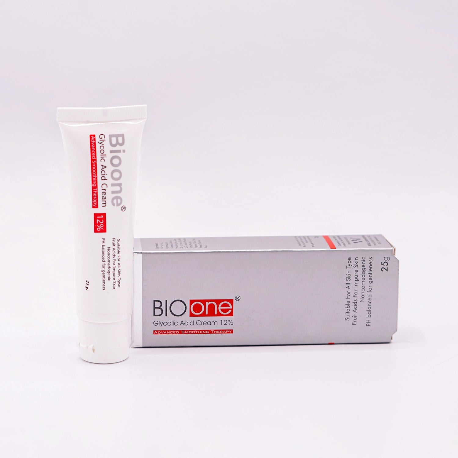 Bioone Glycolic Acid Cream 12%, Advanced Smoothing Therapy, 25g white tube with a red and black label, and its matching white and red box, set on a white background.