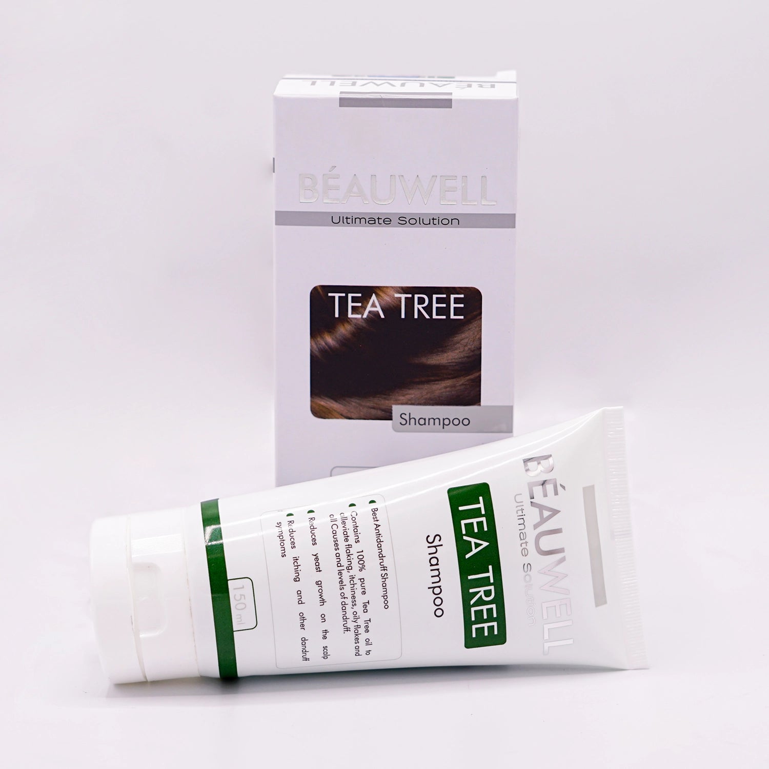 Beauwell Tea Tree Shampoo, an ultimate solution for dandruff, formulated with 100% pure tea tree oil to alleviate itching, reduce yeast overgrowth, and improve dandruff symptoms, shown with its box and tube.