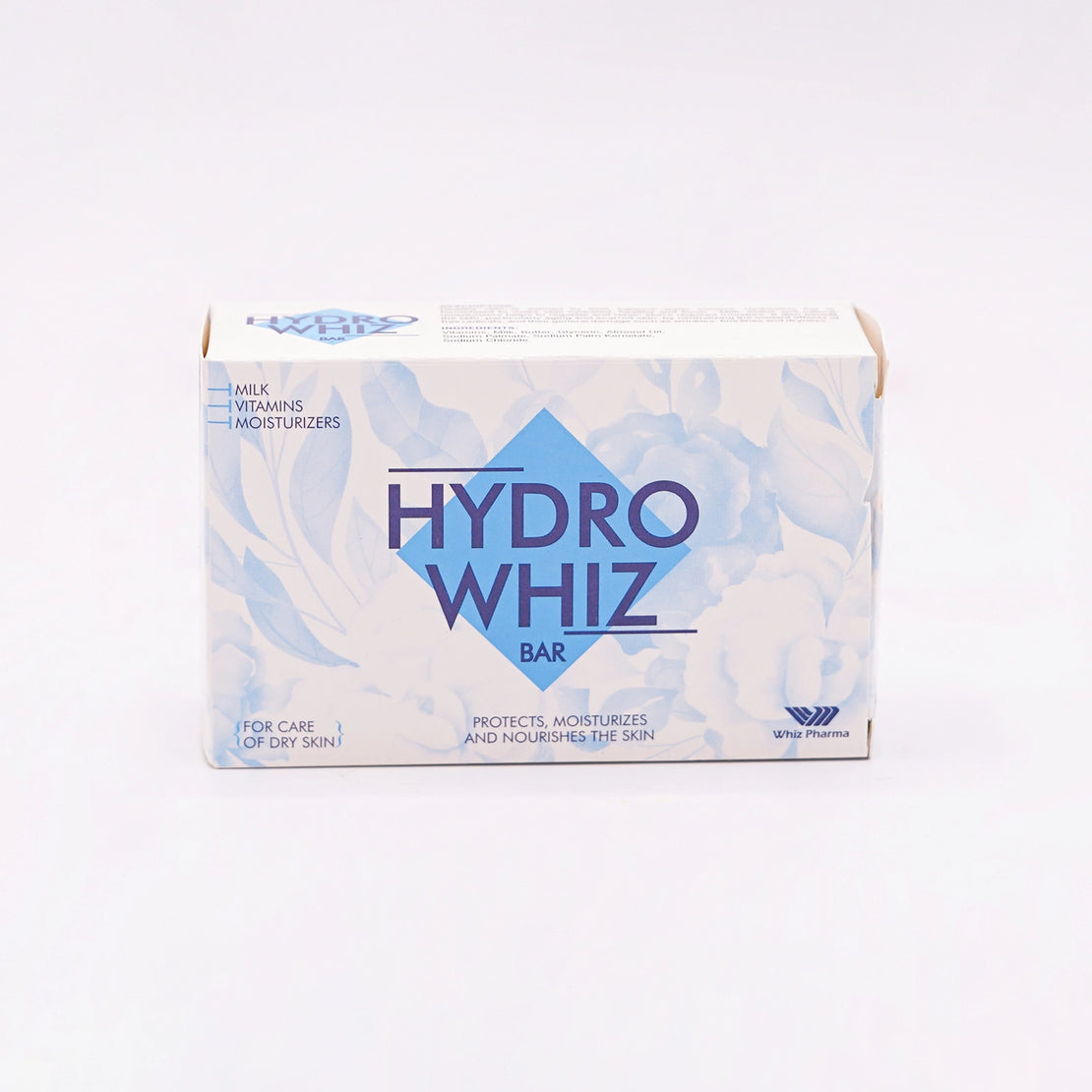 HydroWhiz Bar, containing Milk, Vitamins, and Moisturizers, for the care of dry skin, in a white box with a blue diamond design and floral pattern.