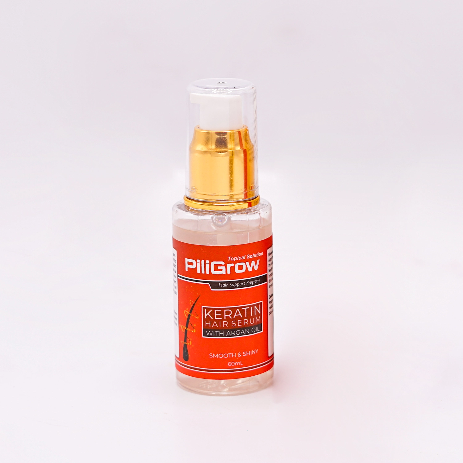 Piligrow Keratin Hair Serum with Argan Oil, designed to make hair smooth and shiny, restore vitality, repair split ends and breakage, and prevent frizz and damage for easier styling.