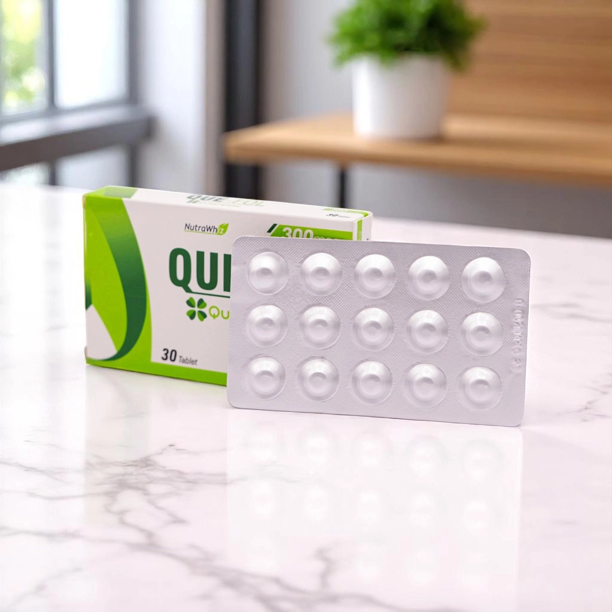 Nutra Whiz QUE FOL 30 Tablets in a white and green box