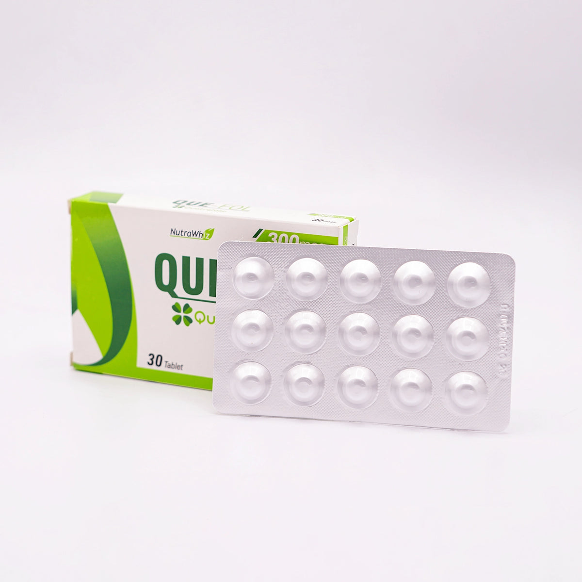 Que-Fol Tablets, a Nutra Whiz 4th generation folic acid supplement for daily use, shown with its box and blister pack.