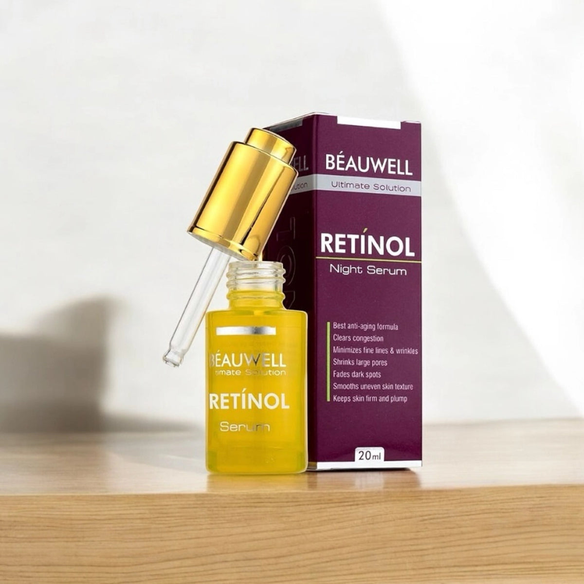 A bottle of Beauwell Retinol Night Serum, an anti-aging formula that helps minimize fine lines and wrinkles, shrink large pores, fade dark spots, and keep skin firm and plump..