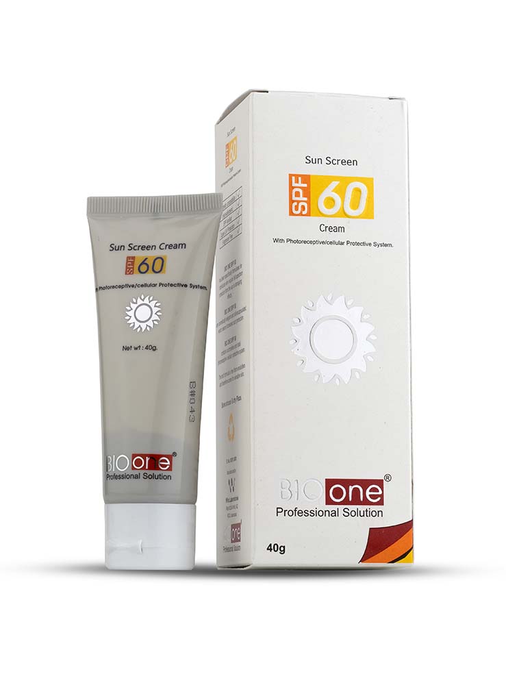 A cream tube next to a box