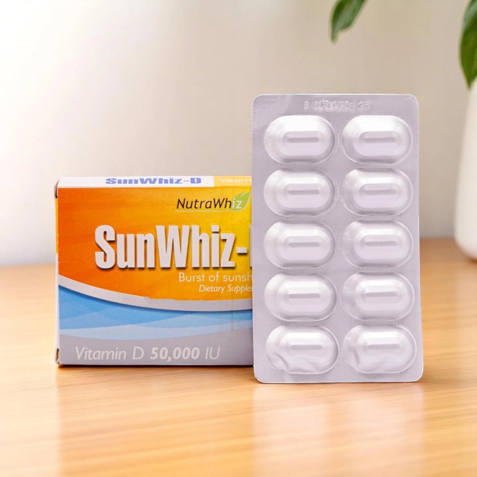 Nutra Whiz Sun whiz D Tablets 50,000 IU in a yellow and white box