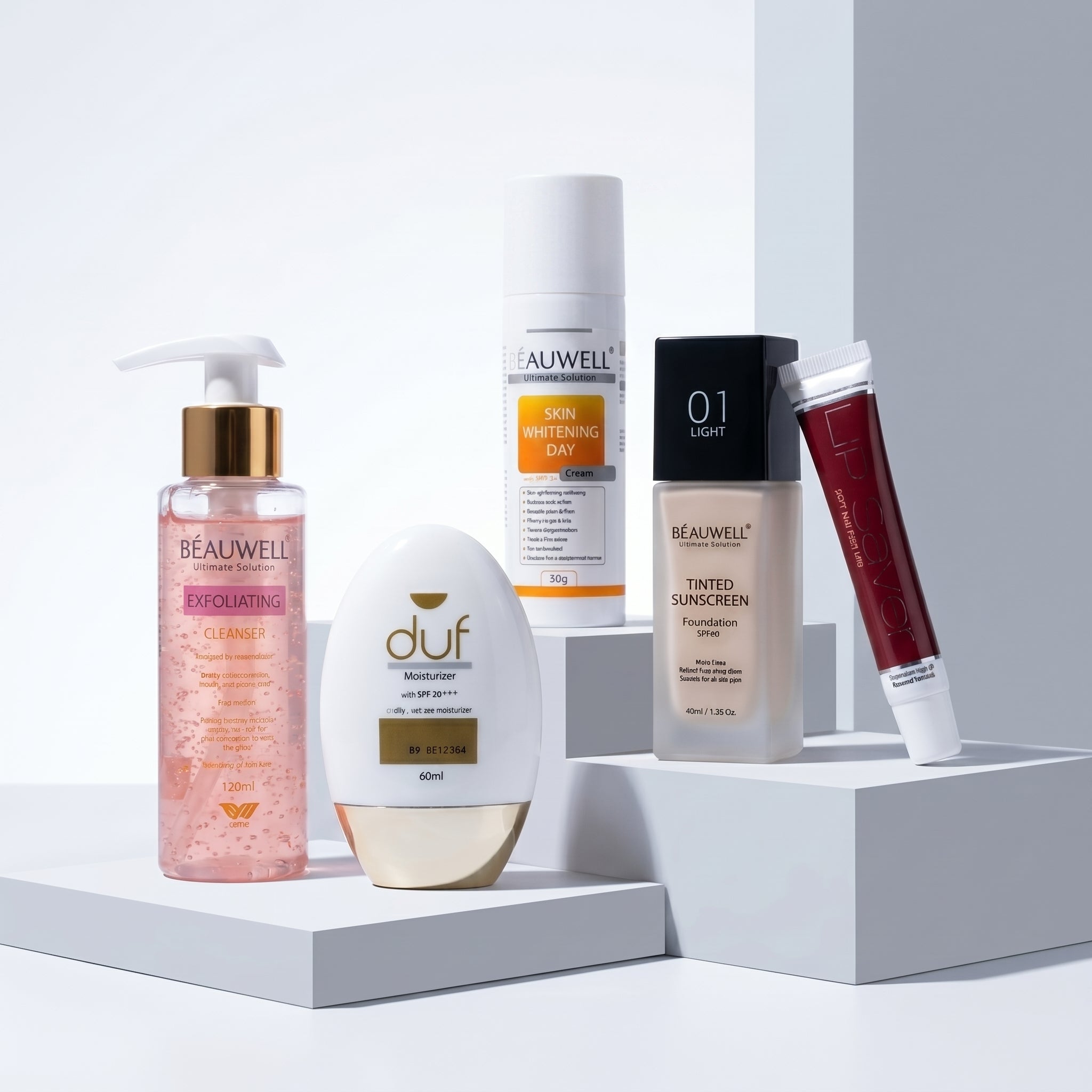 Whiz Bridal Essentials Kit including Beauwell Exfoliating Cleanser, DUF Moisturizer, Skin Whitening Day Cream, Tinted Sunscreen, and Lip Savior on white pedestal blocks.