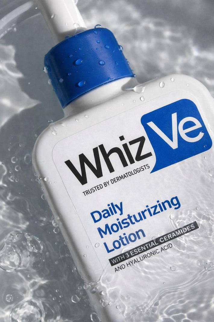 Whiz Ve Daily Moisturizing Lotion with ceramides and hyaluronic acid, shown with a refreshing water splash effect.